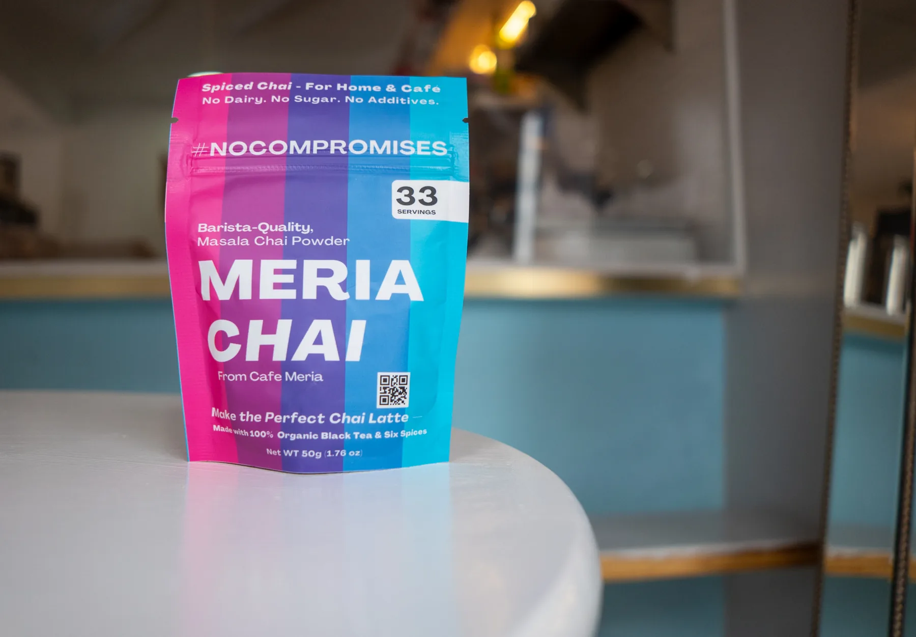 A pouch of Meria Chai on a table at Café Meria